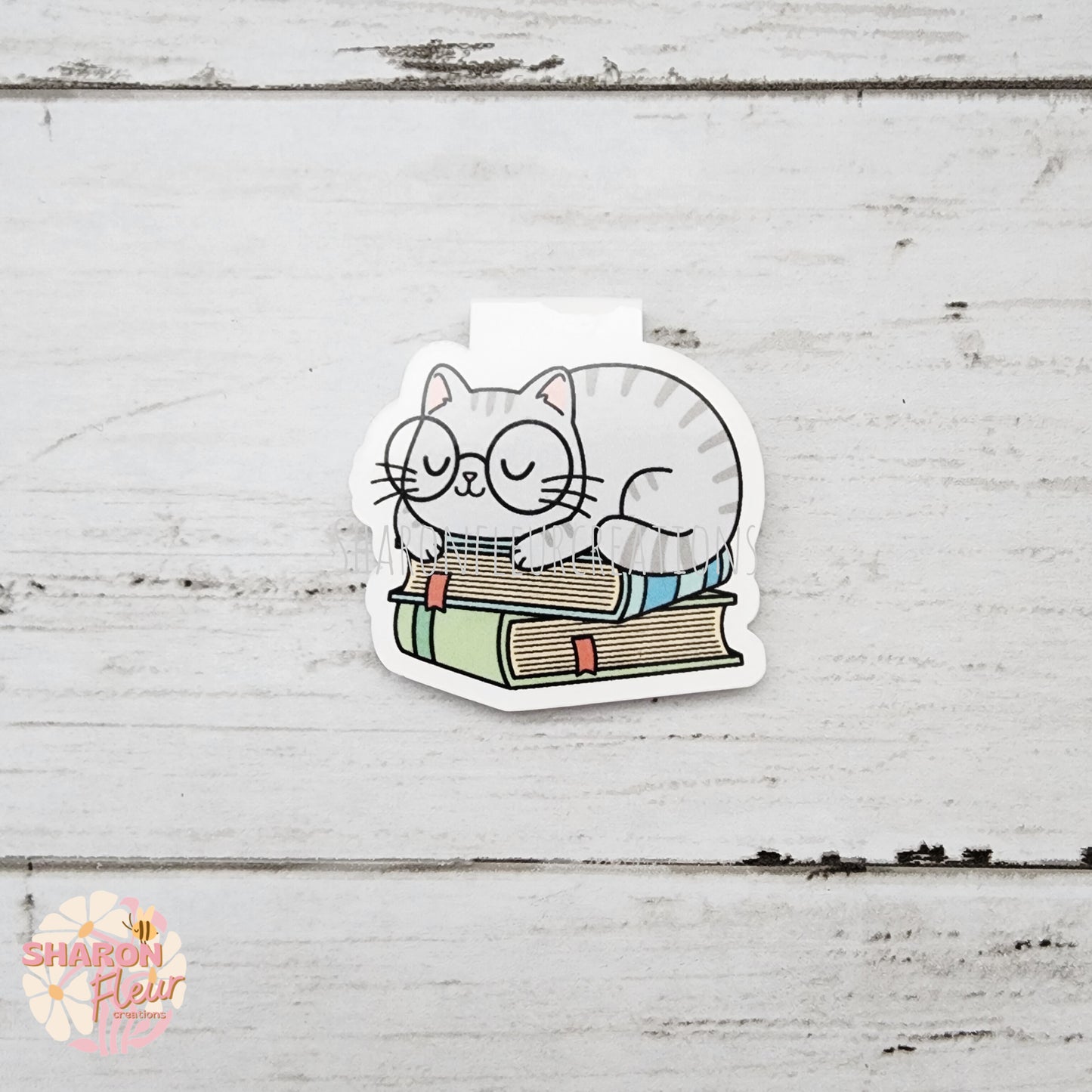 Cat Sleeping on Books Magnetic Bookmark